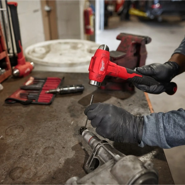 Dead blow ball peen hammer